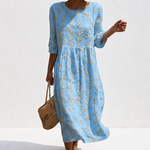 Amélie - Robe féminine décontractée à motifs floraux.